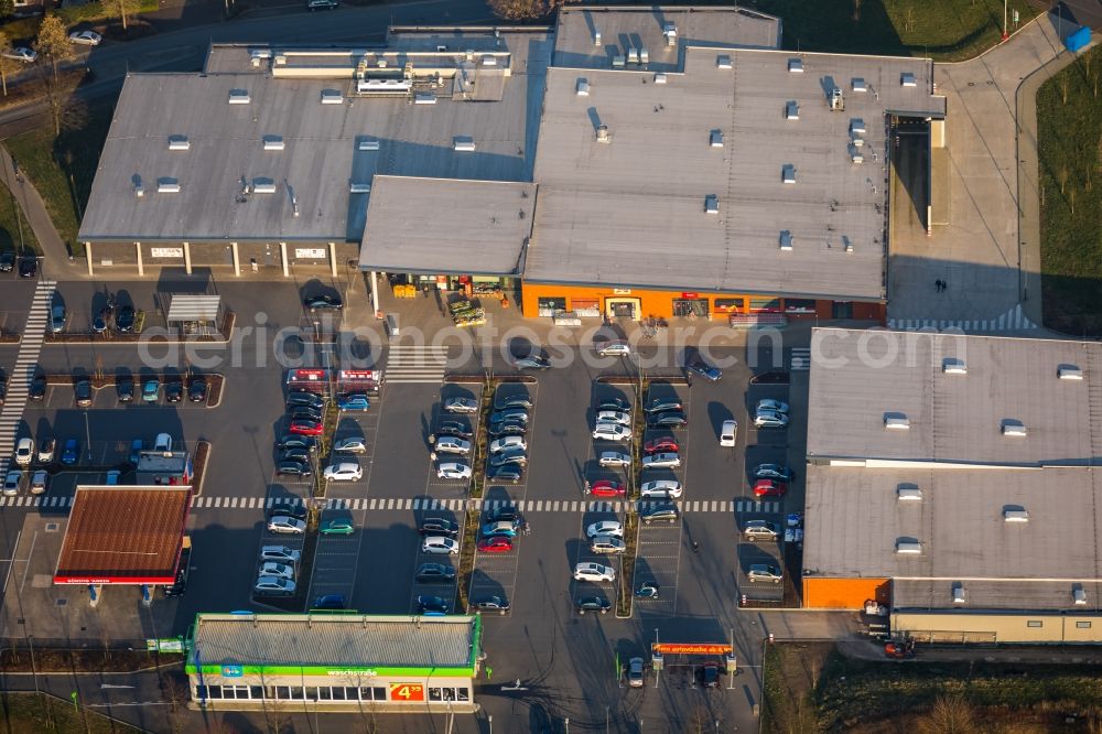 Dorsten from the bird's eye view: Buildings of the shopping center dm-drogerie markt and Rewe in Dorsten in the state North Rhine-Westphalia, Germany