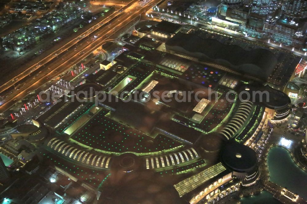 Dubai from the bird's eye view: Building of the shopping center The Address Dubai Mall in Dubai in United Arab Emirates