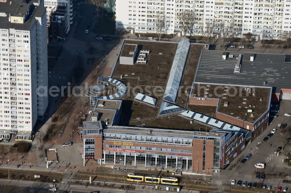 Berlin from the bird's eye view: Building of the shopping center Allee-Center on the Landsberger Allee in Berlin. In the Centre are shops such as woolworth, drugstore Rossmann and the mobile phone company Vodafone