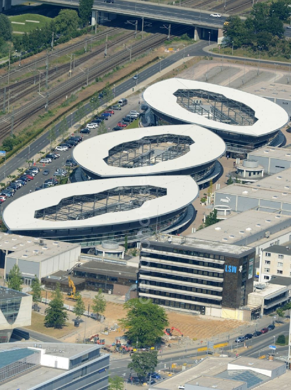 Aerial image Wolfsburg - Building of the shopping center designer outlets by architect Gerd Graf in Wolfsburg in the state Lower Saxony