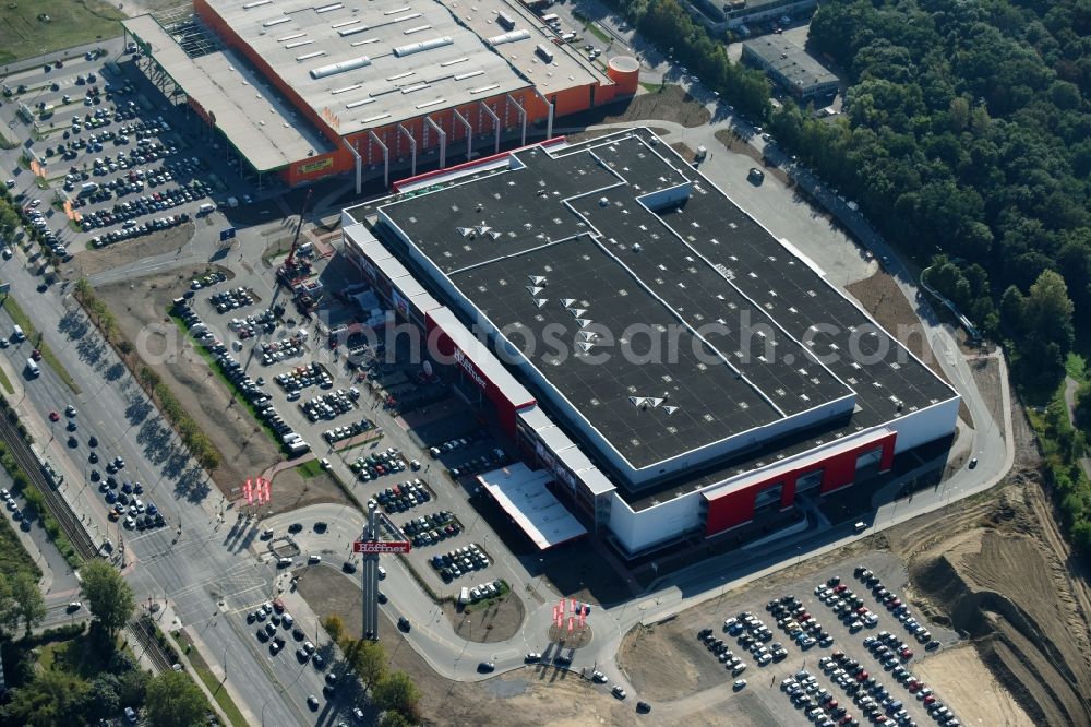 Berlin from above - Building of the shopping center of Hoeffner Moebelgesellschaft GmbH & Co.KG and of Krieger-Gruppe on Landsberger Allee in Berlin Lichtenberg in the state Berlin, Germany