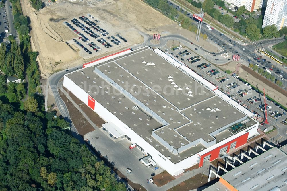 Aerial image Berlin - Building of the shopping center of Hoeffner Moebelgesellschaft GmbH & Co.KG and of Krieger-Gruppe on Landsberger Allee in Berlin Lichtenberg in the state Berlin, Germany