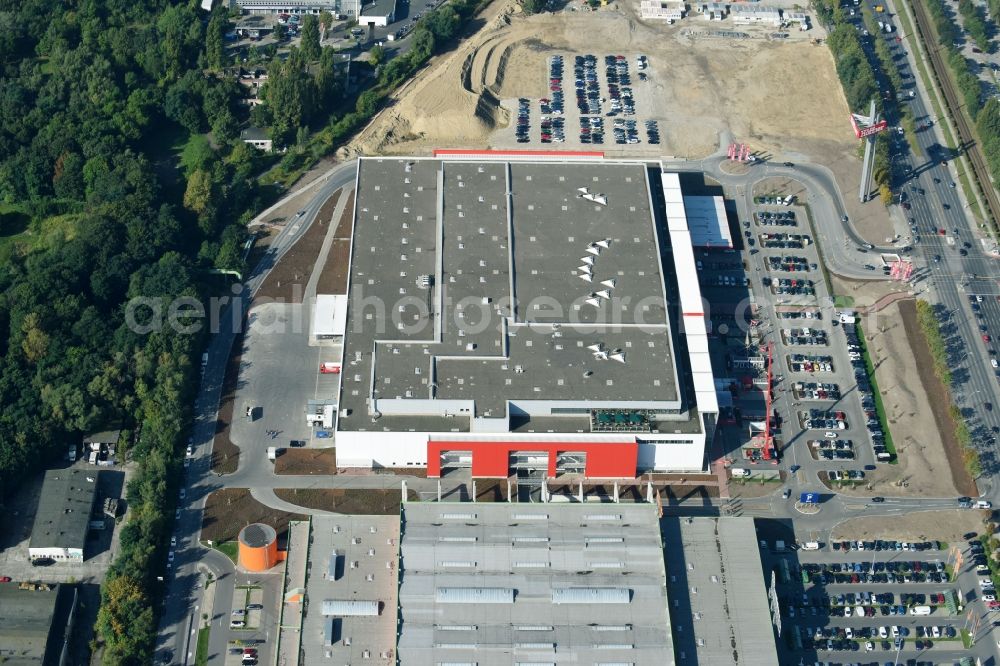 Aerial photograph Berlin - Building of the shopping center of Hoeffner Moebelgesellschaft GmbH & Co.KG and of Krieger-Gruppe on Landsberger Allee in Berlin Lichtenberg in the state Berlin, Germany