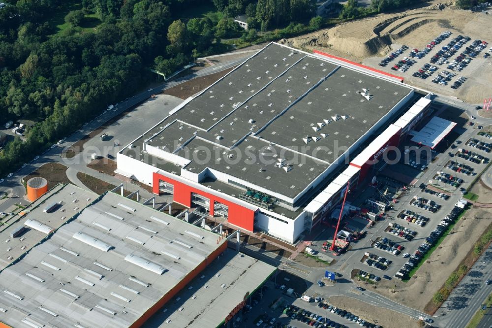 Berlin from above - Building of the shopping center of Hoeffner Moebelgesellschaft GmbH & Co.KG and of Krieger-Gruppe on Landsberger Allee in Berlin Lichtenberg in the state Berlin, Germany