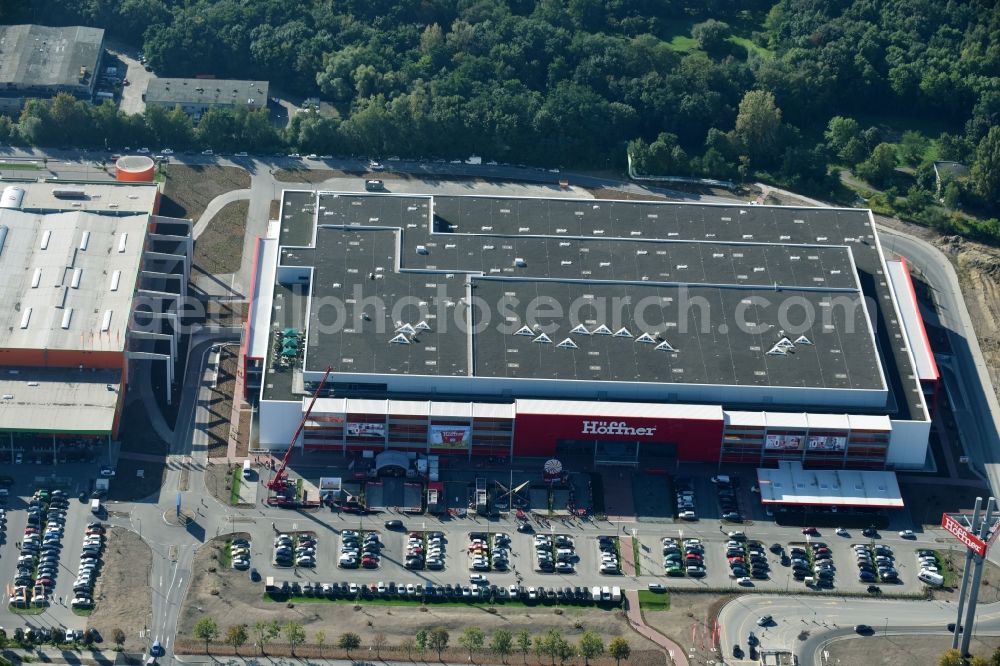 Aerial image Berlin - Building of the shopping center of Hoeffner Moebelgesellschaft GmbH & Co.KG and of Krieger-Gruppe on Landsberger Allee in Berlin Lichtenberg in the state Berlin, Germany