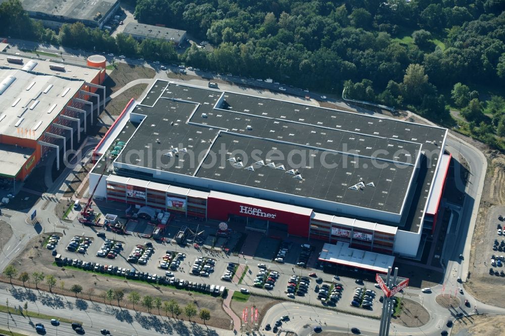 Aerial photograph Berlin - Building of the shopping center of Hoeffner Moebelgesellschaft GmbH & Co.KG and of Krieger-Gruppe on Landsberger Allee in Berlin Lichtenberg in the state Berlin, Germany