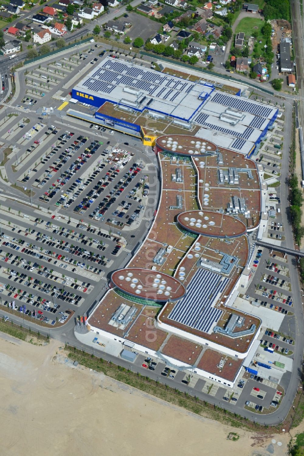 Aerial photograph Dänischburg, Lübeck - Building the shopping mall LUV SHOPPING at IKEA furnishing house in Daenischburg, Luebeck in Schleswig-Holstein