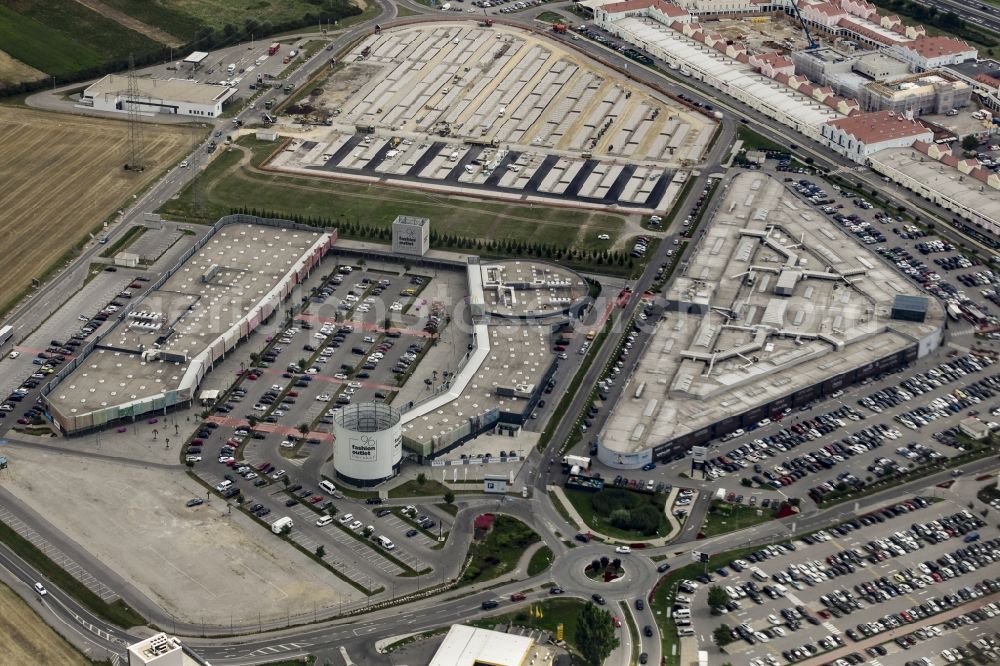 Aerial photograph Parndorf - Building of the shopping center Parndorf Fashion Outlet on the Gewerbestrasse in Parndorf in Burgenland, Austria