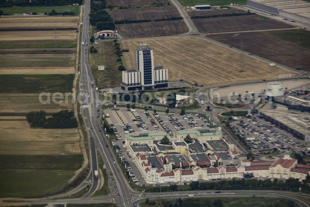 Aerial photograph Parndorf - Building of the shopping center Parndorf Fashion Outlet on the Gewerbestrasse in Parndorf in Burgenland, Austria