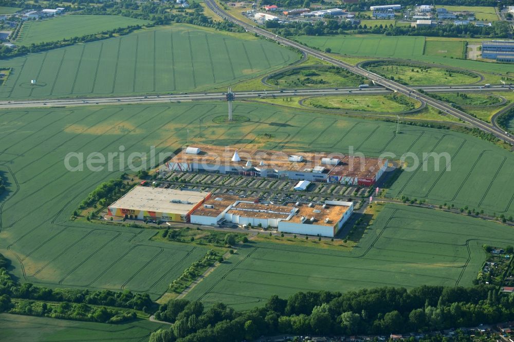 Aerial photograph Magdeburg - Building the shopping center Am Pfahlberg in Magdeburg in the state Saxony-Anhalt. Located are each a subsidiary of Hoffner Furniture Company GmbH & Co. KG, Media Markt, Sconto SB The furniture market and CineStar Magdeburg GmbH