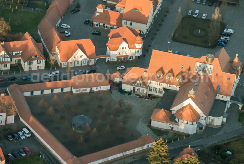 Aerial image Senftenberg - Building of the shopping center on Platz des Friedens in Senftenberg in the state Brandenburg