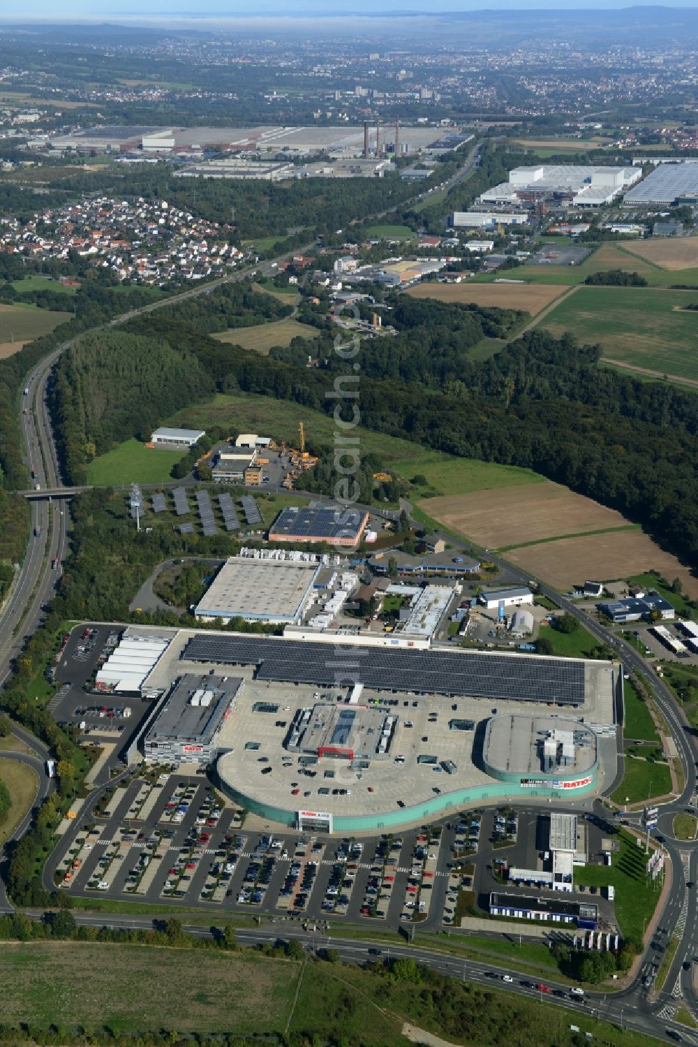 Aerial photograph Baunatal - Building of the shopping center RATIO_Land of Werbegemeinschaft RATIO_Land GbR in Baunatal in the state Hesse