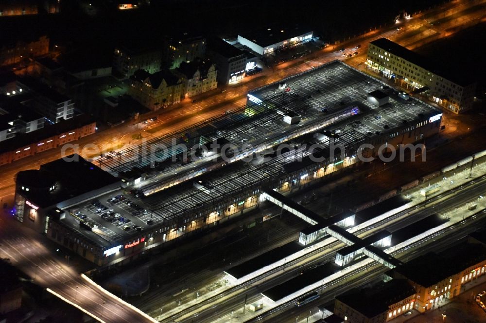 Aerial image Regensburg - Night view Building of the shopping center Regensburg Arcaden der ECE-Projektmanagement GmbH on Friedenstrasse in Regensburg in the state Bavaria