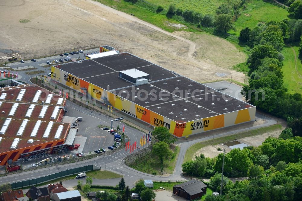 Dänischburg, Lübeck from above - Building the shopping mall SCONTO Moebel Sofort in Daenischburg, Luebeck in Schleswig-Holstein. The complex is part of the IKEA Centre Germany GmbH, a company of the IKEA Centres Group A / S