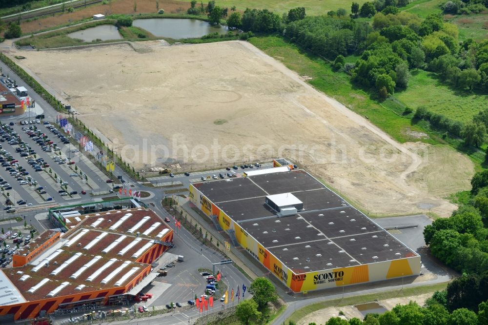 Dänischburg, Lübeck from the bird's eye view: Building the shopping mall SCONTO Moebel Sofort in Daenischburg, Luebeck in Schleswig-Holstein. The complex is part of the IKEA Centre Germany GmbH, a company of the IKEA Centres Group A / S