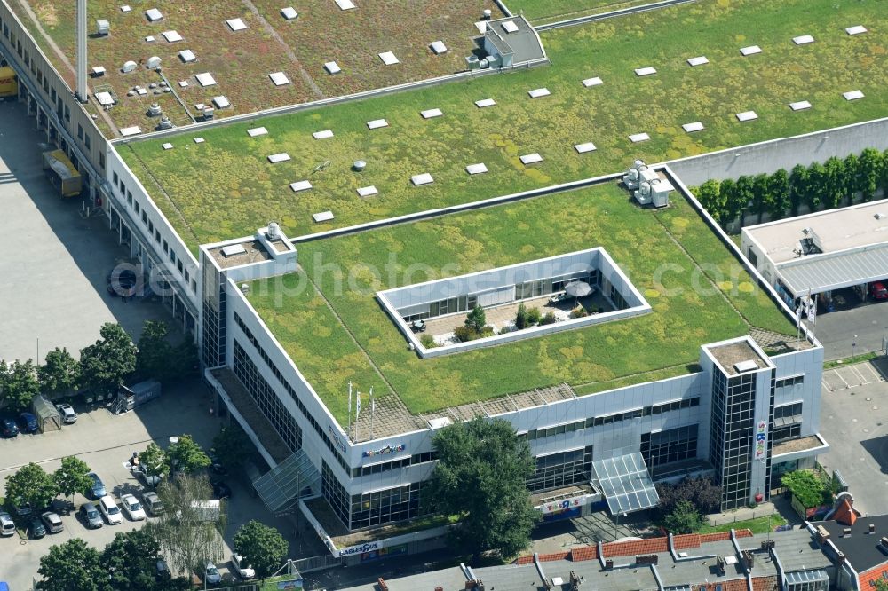 Aerial photograph Berlin - Building of the shopping center of Toys R Us GmbH on Karl-Marx-Stasse in the district Neukoelln in Berlin, Germany