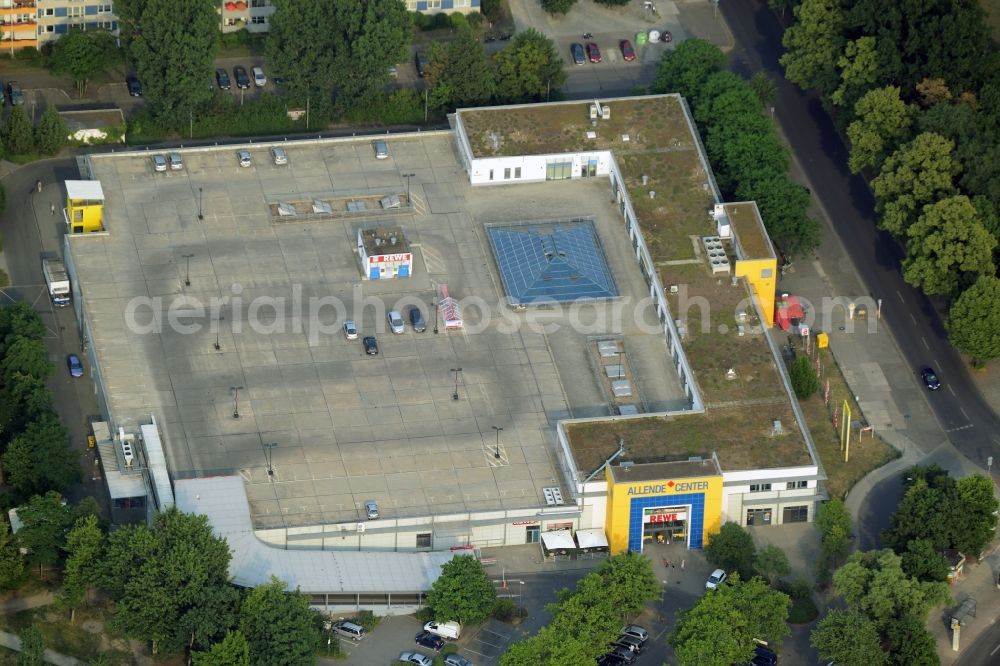 Berlin from above - Shopping centre Allende-Center in the Koepenick part of the district of Treptow-Koepenick in Berlin in Germany. The center is a shopping mall in the Allende quarter on Pablo-Neruda-Street. It includes a REWE supermarket