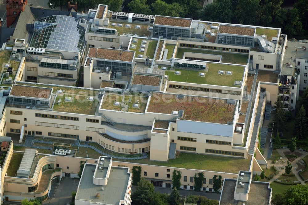 Berlin from above - Building the shopping center Das Schloss (The Castle) in the Steglitz part of Berlin in Germany. The shopping mall consists of several levels which can be seen on its roof as well. It also includes a round glass roof and an old brick tower