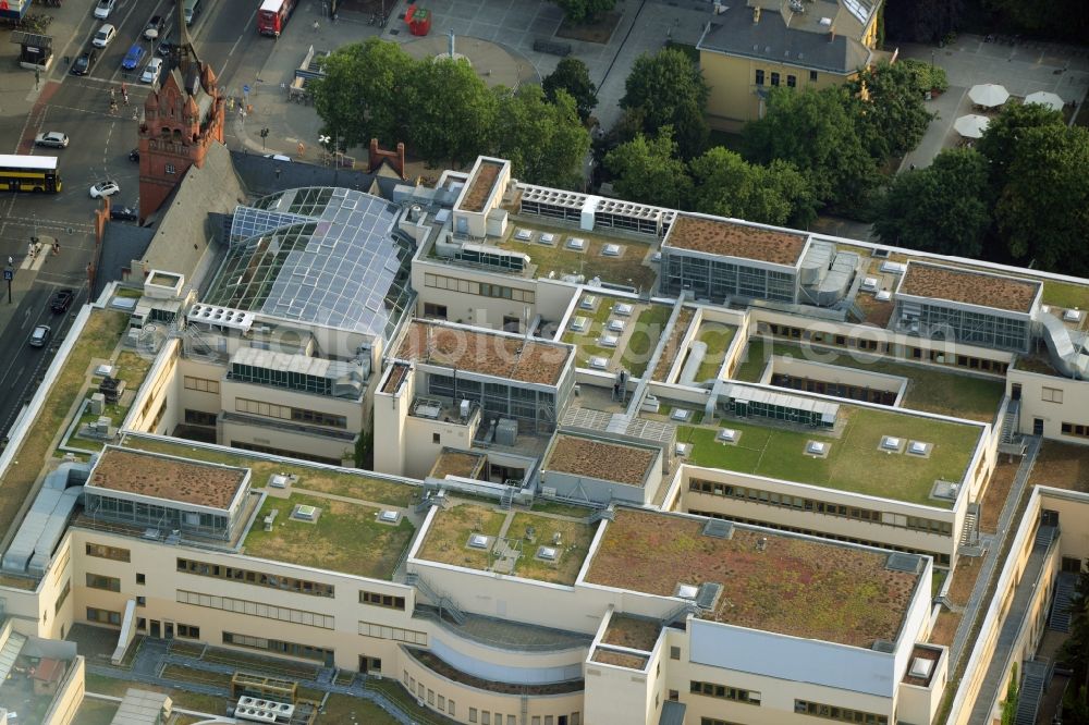 Berlin from the bird's eye view: Building the shopping center Das Schloss (The Castle) in the Steglitz part of Berlin in Germany. The shopping mall consists of several levels which can be seen on its roof as well. It also includes a round glass roof and an old brick tower