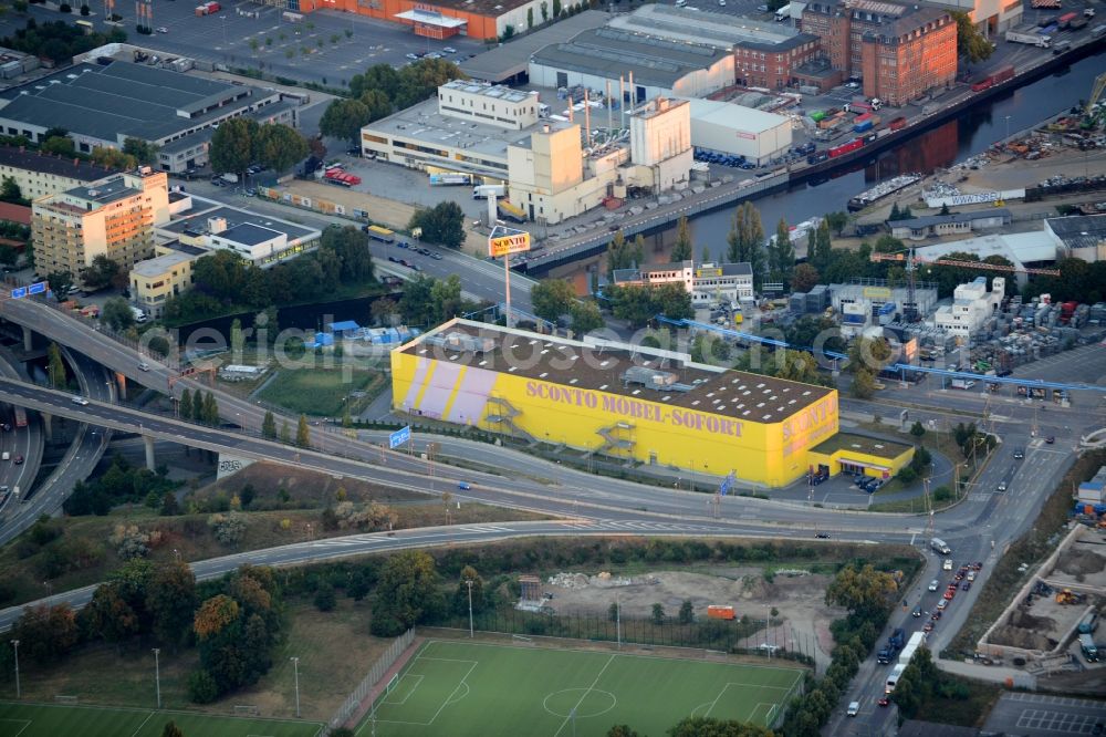 Berlin from the bird's eye view: Building of the store - furniture market Sconto at Grenzallee in the Neukoelln district in Berlin in Germany