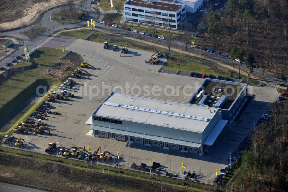 Aerial photograph Kleinmachnow - Building of the company headquarters of Liebherr at the commercial Area Europarc Dreilinden in Kleinmachnow OT Dreilinden in Brandenburg