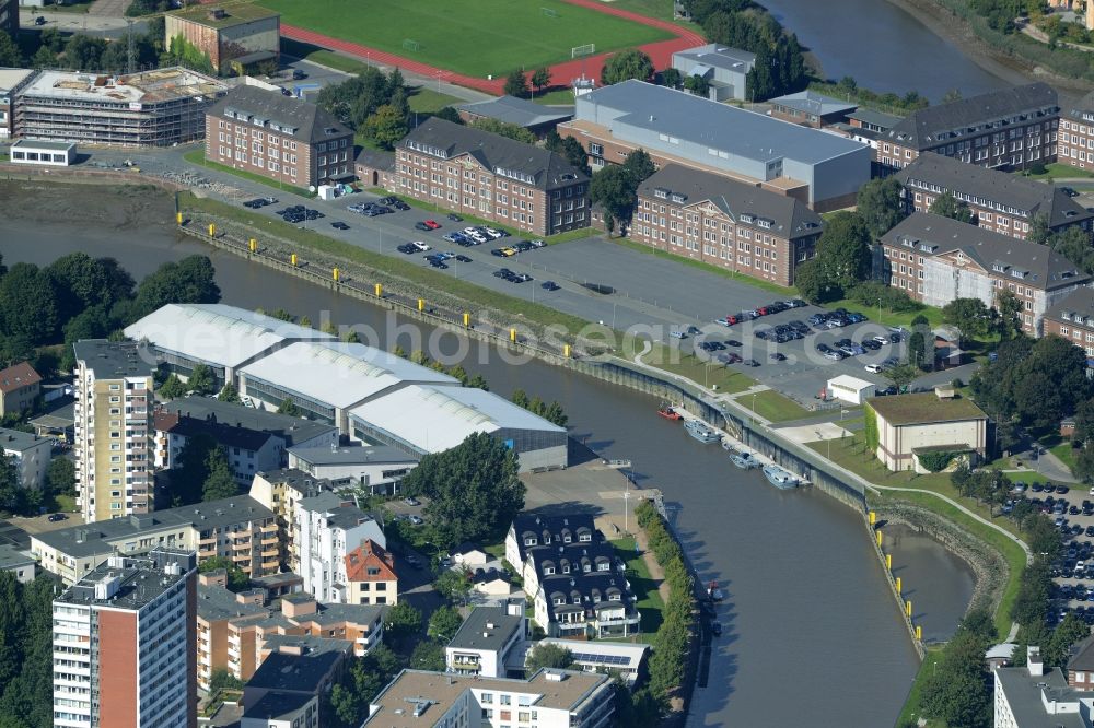 Aerial photograph Bremerhaven - Buildings and compound of the Marine operations school in Bremerhaven in the state of Bremen. The compound is located on the Geeste Riverbank and includes a sports pitch