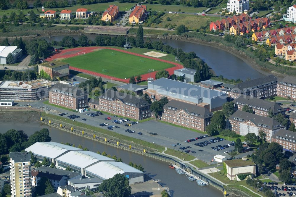 Bremerhaven from above - Buildings and compound of the Marine operations school in Bremerhaven in the state of Bremen. The compound is located on the Geeste Riverbank and includes a sports pitch