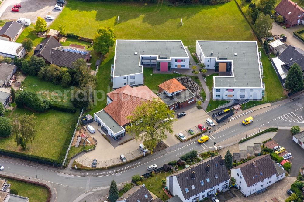 Aerial image Fröndenberg/Ruhr - Building of the municipal administration of Gemeindezentrum Ardey u. Jugendhaus on Ardeyer Strasse in the district Ardey in Froendenberg/Ruhr in the state North Rhine-Westphalia, Germany