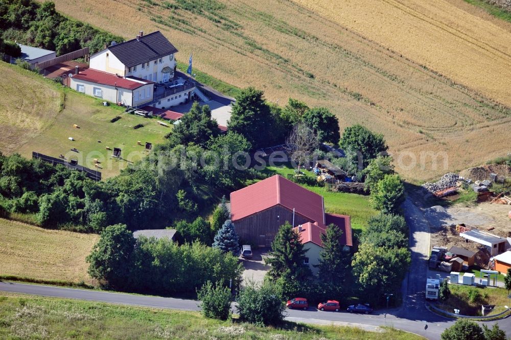 Rottendorf from above - View of the Gerhard Launer WFL-GmbH in Rottendorf in the state Bavaria. In the background the business park Hasenberg will be built