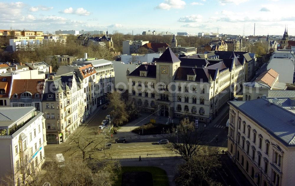 Aerial photograph Halle - The main post office in Halle-Saale, Saxony-Anhalt, is located at the Joliot-Curie Square. The old main post office was built in the period of the Neo-Romanesque style by a preliminary draft of the post Baurat Neumann