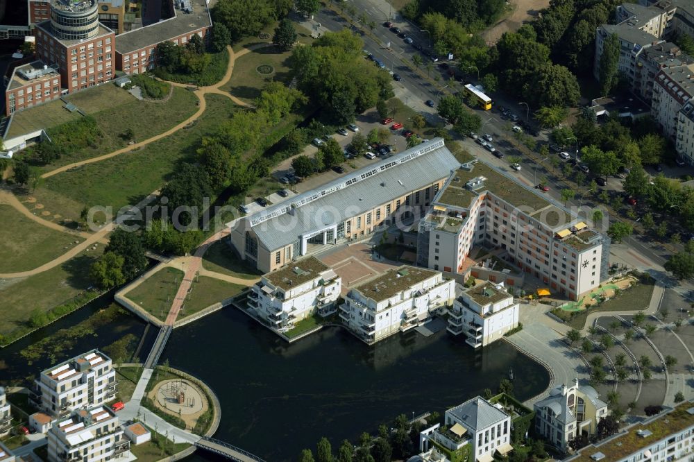 Aerial photograph Berlin - Building of the Humboldt library and residential buildings on the harbour of Tegel in the district of Reinickendorf in Berlin in Germany. The building includes the town library