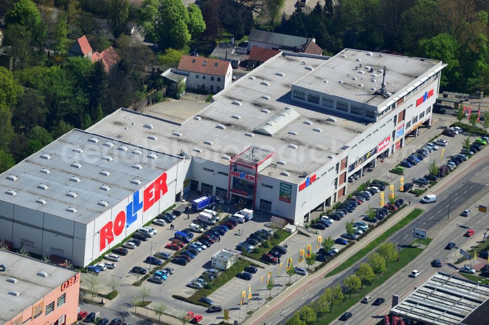 Aerial image Berlin Mahlsdorf - Building - the complex ROLLER shopping center on the B1 in Mahlsdorf borough of Marzahn-Hellersdorf of Berlin