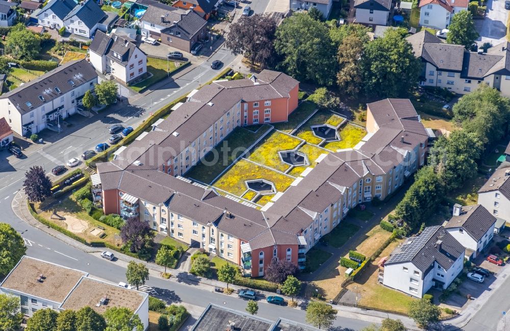 Aerial photograph Menden (Sauerland) - Building of a multi-family residential building on Clemens-Brentano-Strasse corner Bieberberg in Menden (Sauerland) in the state North Rhine-Westphalia, Germany