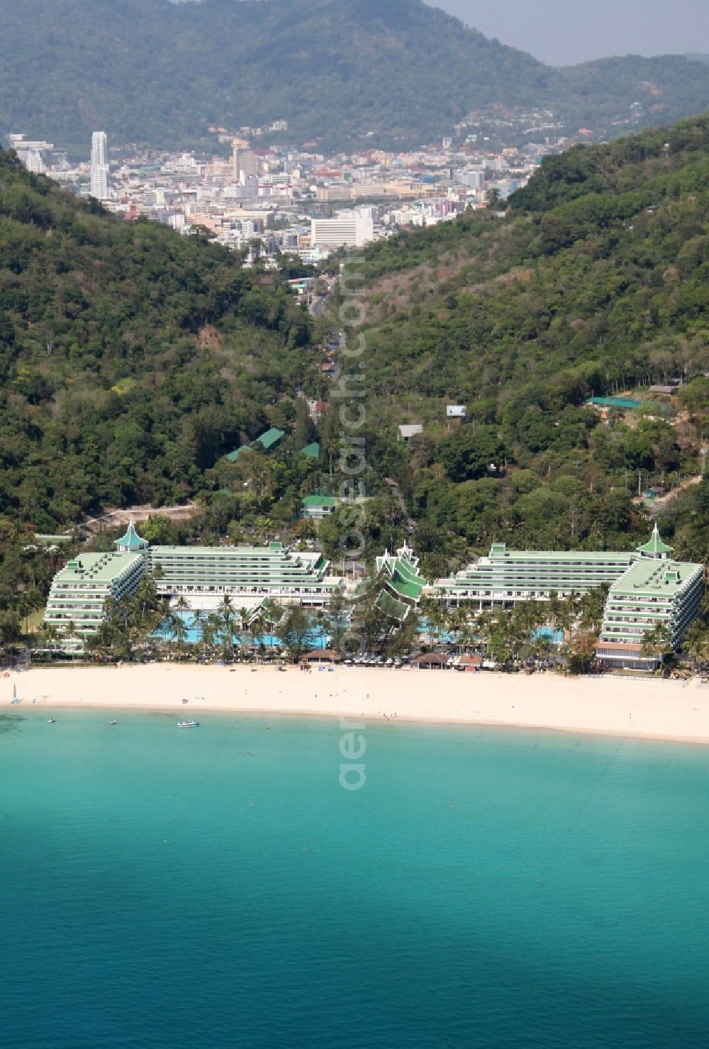 Aerial image Karon - The Le Meridian Beach Hotel near Karon town on the island of Phuket in Thailand has its own sandy beach in an exclusive bay