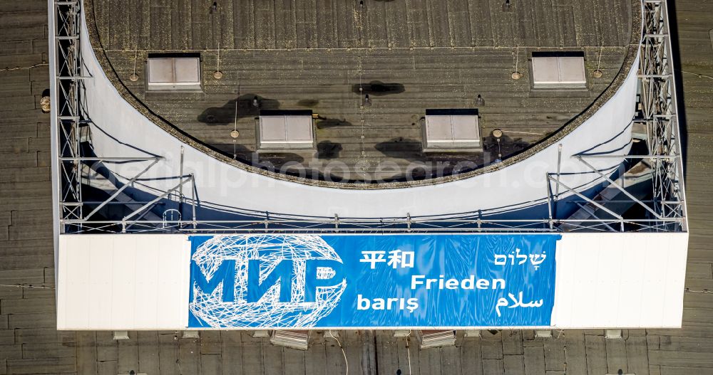 Aerial image Gelsenkirchen - Peace poster on the building of the Theater-Schauspielhaus Musiktheater im Revier Gelsenkirchen on Kennedyplatz in Gelsenkirchen in the state of North Rhine-Westphalia