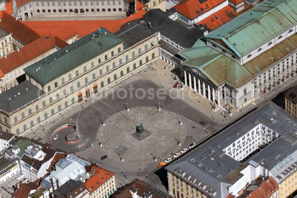 München from the bird's eye view: Building of the national theater at the Max-Joseph-Platz in Munich, Bavaria. The opera house in the Old Town is the venue for the Bavarian State Opera, the Bavarian State Orchestra and the Bavarian State Ballet