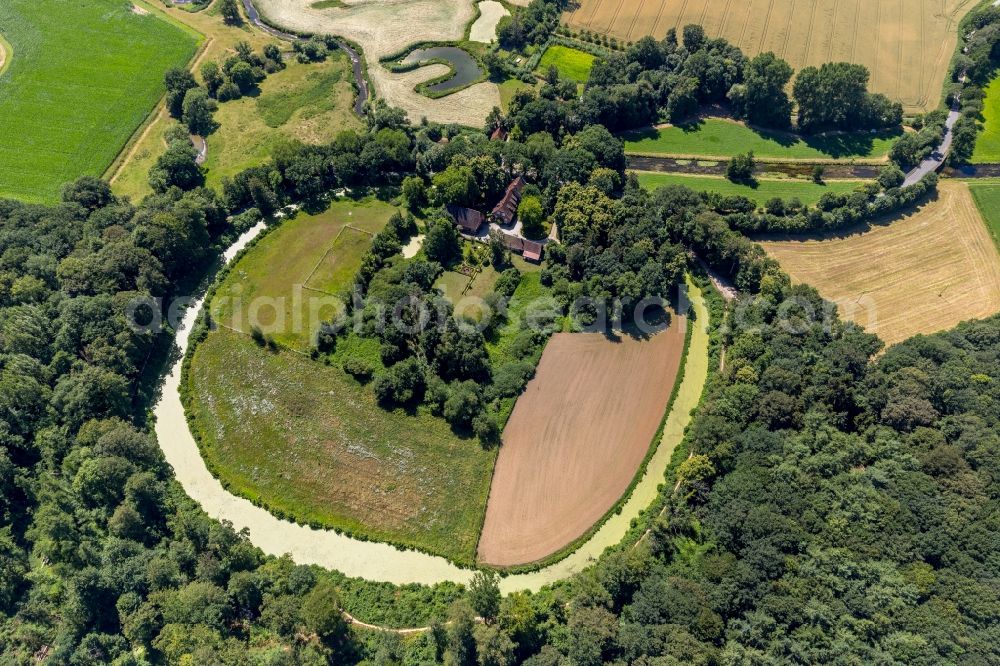 Telgte from the bird's eye view: Buildings and parks of the former manor Haus Langen with a water mill in Telgte in the federal state of North Rhine-Westphalia, Germany