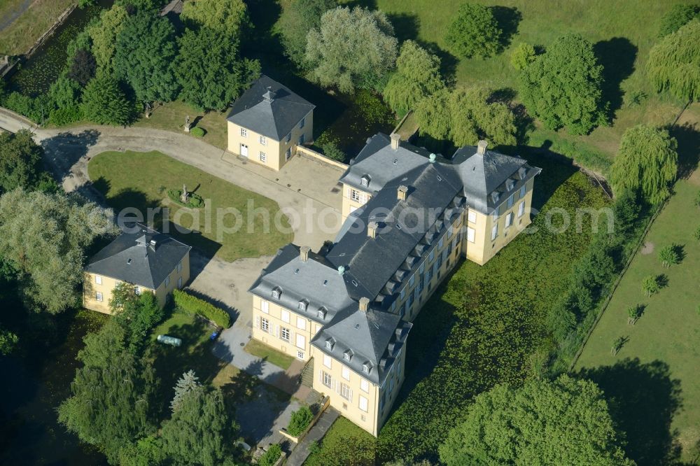 Wadersloh from above - Building and Castle Park of Castle Crassenstein in the Diestedde part of the borough of Wadersloh in the state of North Rhine-Westphalia. The historic building with its yellow facade, the park and pond is located in the North of Diestedde. Today, it is used as an event location and research facility