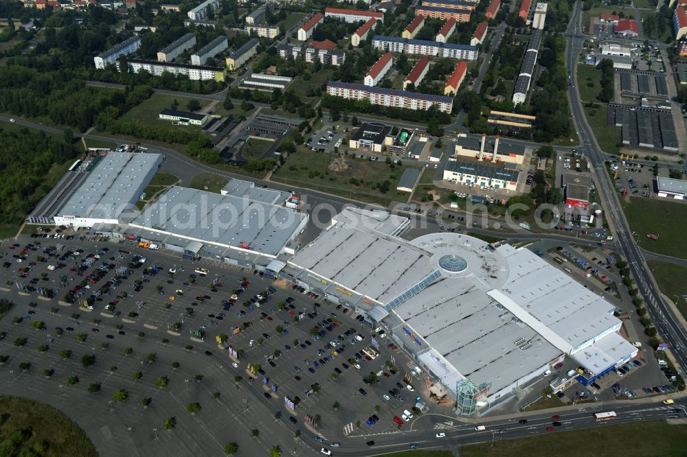 Aerial image Riesa - Building and parking lot of the shopping center Riesapark in Riesa in the state Saxony