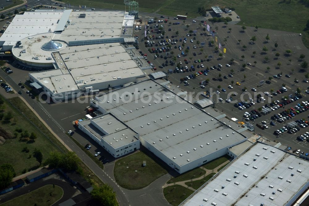 Aerial photograph Riesa - Building and parking lot of the shopping center Riesapark in Riesa in the state Saxony