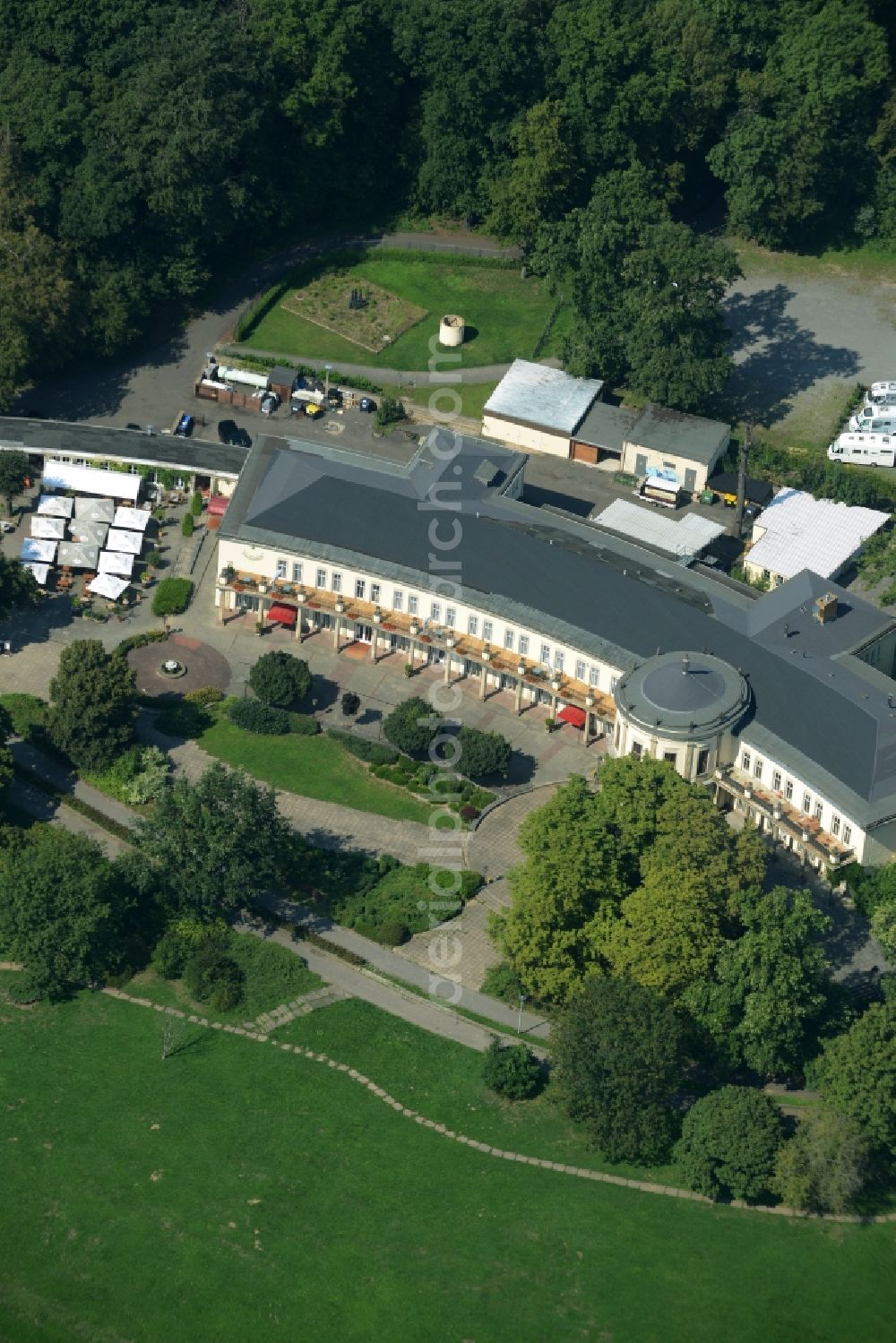 Leipzig from the bird's eye view: Building of the park castle in agra-park in Leipzig in the state of Saxony. The complex is home to the park restaurant