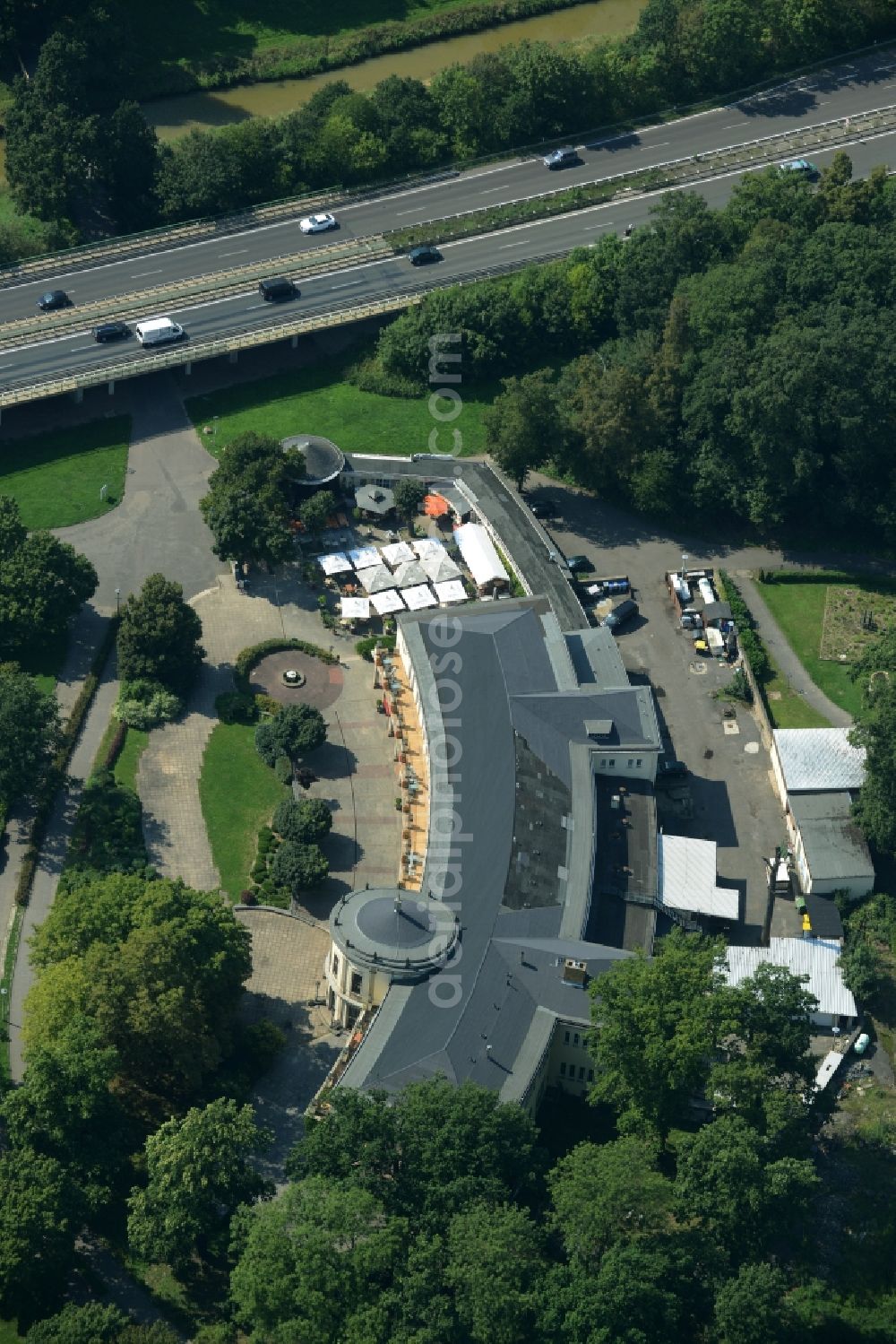 Leipzig from above - Building of the park castle in agra-park in Leipzig in the state of Saxony. The complex is home to the park restaurant