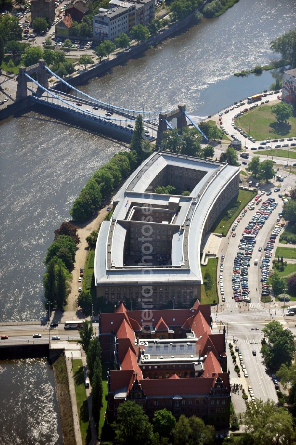 WROCLAW - BRESLAU from the bird's eye view: The building of the Regional Council of Lower Silesia on the banks of the Oder river in Wroclaw / Breslau in Lower Silesia in Poland. In the immediate vicinity of the former government building, now the National Museum of the Plac Powstancow