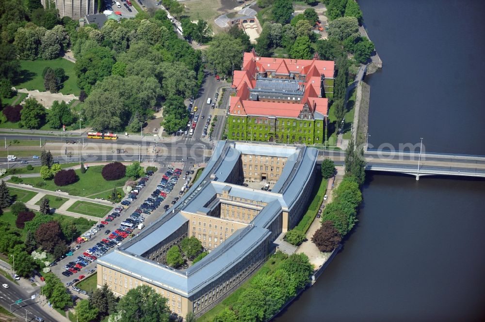 WROCLAW - BRESLAU from the bird's eye view: The building of the Regional Council of Lower Silesia on the banks of the Oder river in Wroclaw / Breslau in Lower Silesia in Poland. In the immediate vicinity of the former government building, now the National Museum of the Plac Powstancow