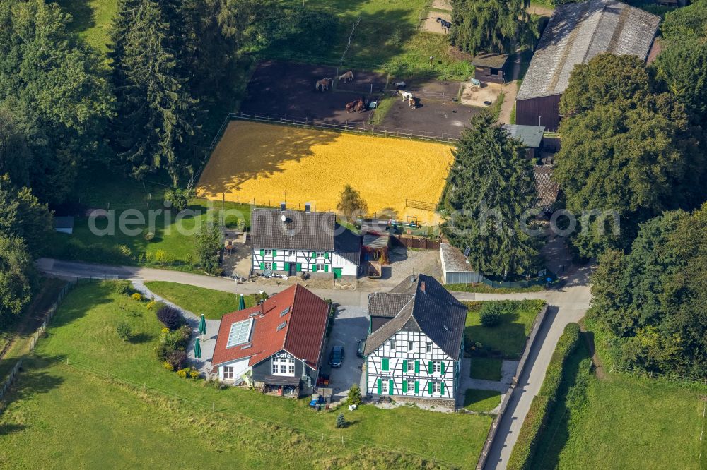 Aerial photograph Ennepetal - Building of the restaurant Cafe Huelsenbecke and horse farm on street Huelsenbecke in Ennepetal at Ruhrgebiet in the state North Rhine-Westphalia, Germany