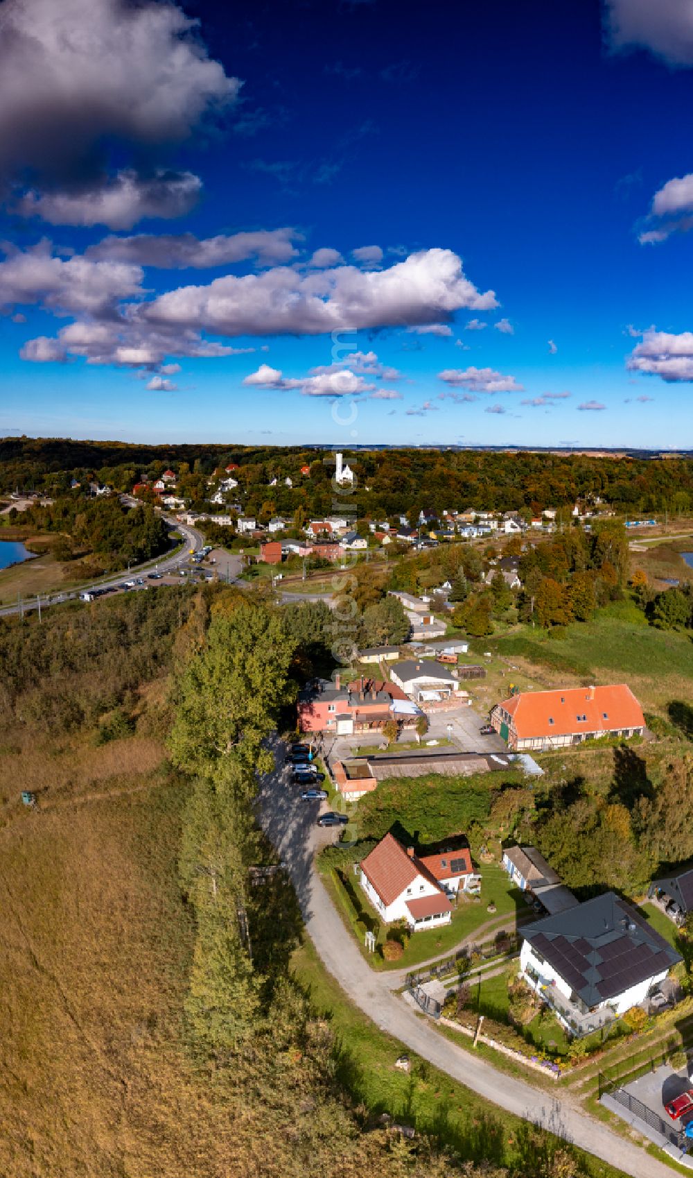 Lietzow from the bird's eye view: Building of the restaurant Traditionsraeucherei Lietzow on street Spitzer Ort in Lietzow in the state Mecklenburg - Western Pomerania, Germany