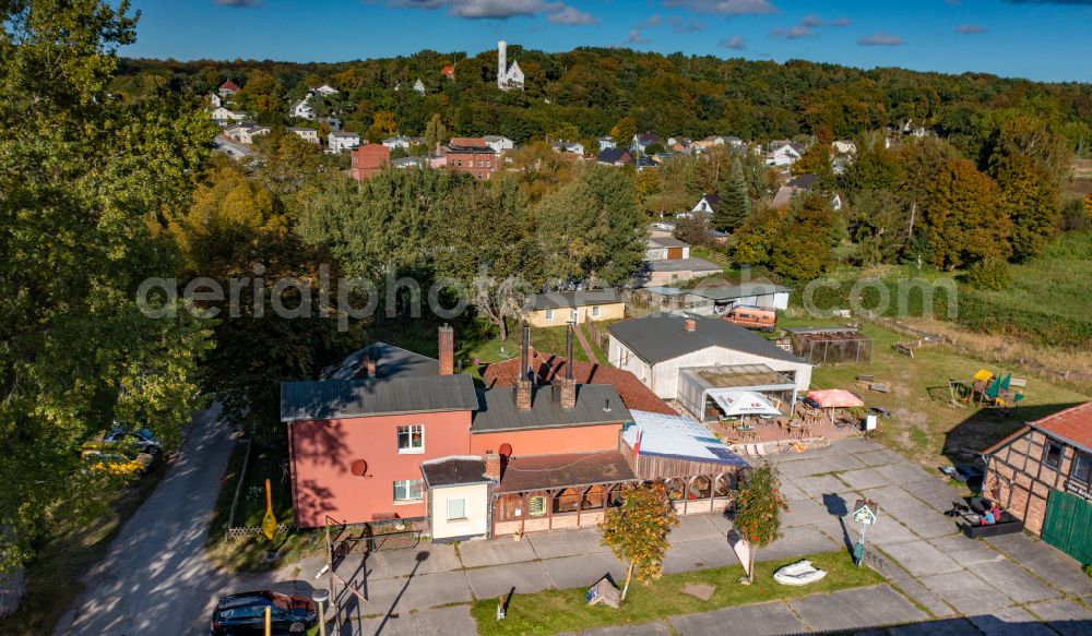 Aerial image Lietzow - Building of the restaurant Traditionsraeucherei Lietzow on street Spitzer Ort in Lietzow in the state Mecklenburg - Western Pomerania, Germany