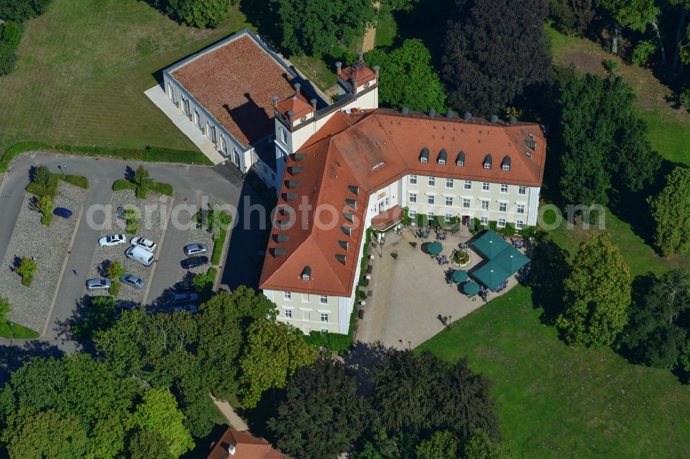 Aerial image Lübbenau/Spreewald - Castle hotel building Schloss Luebbenau - Hotelbetriebsgesellschaft Schloss Luebbenau mbH in Luebbenau/Spreewald at Spreewald in the state Brandenburg, Germany