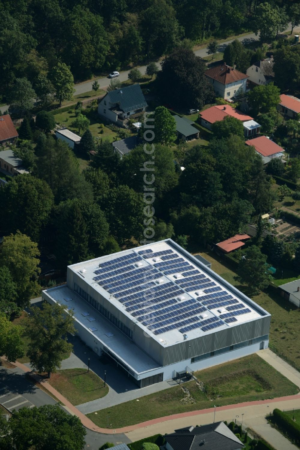 Aerial image Grünheide (Mark) - Building of the sports and multi-functional hall Mueggelspreehalle in the Hangelsberg part of Gruenheide (Mark) in the state of Brandenburg. The architectural distinct hall is used for sports events and is the home pitch of SG Hangelsberg 47 e.V