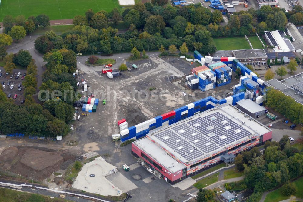 Aerial image Göttingen - Area of a bomb site secured with a protective wall made of stacked containers at the building of the Sparkassen-Arena sports hall in Goettingen in the state of Lower Saxony, Germany